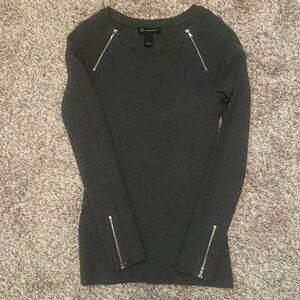 Sweater with functional zippers